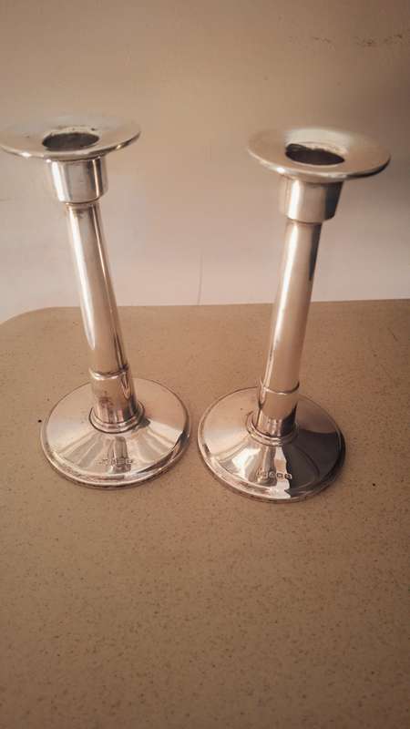 A pair of vintage hallmarked sliver candles