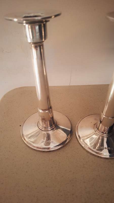 A pair of vintage hallmarked sliver candles