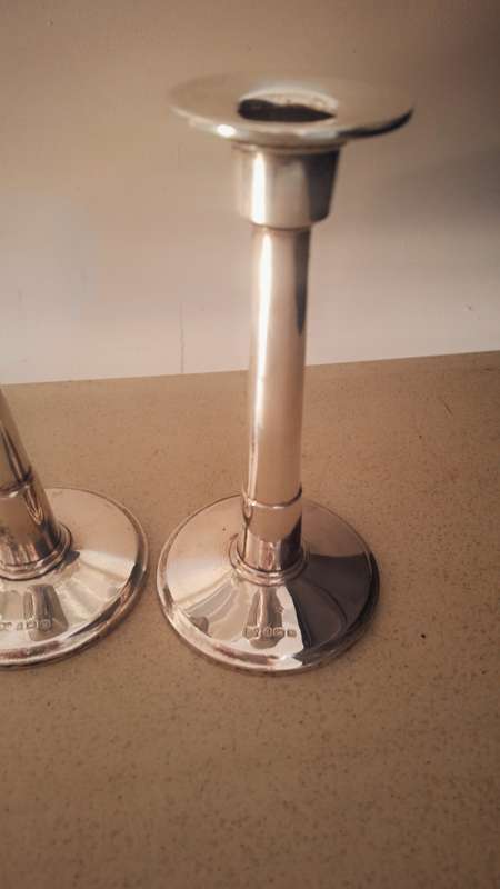 A pair of vintage hallmarked sliver candles
