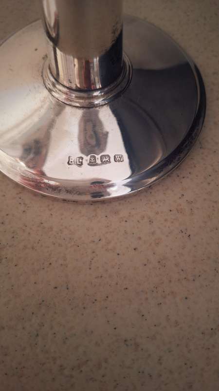 A pair of vintage hallmarked sliver candles