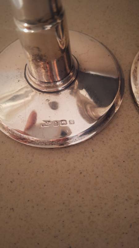A pair of vintage hallmarked sliver candles