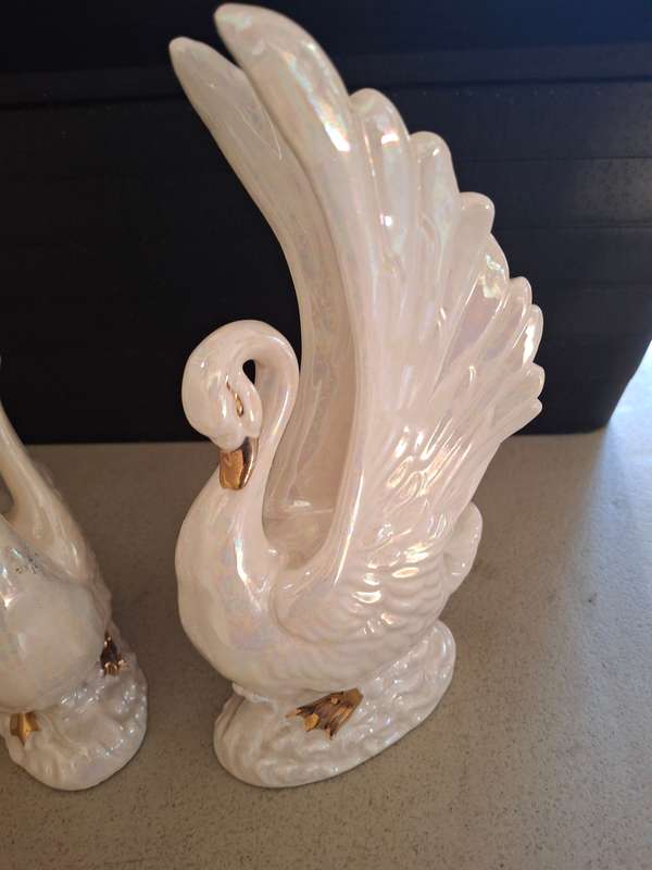 Pair of luster style procelain swans