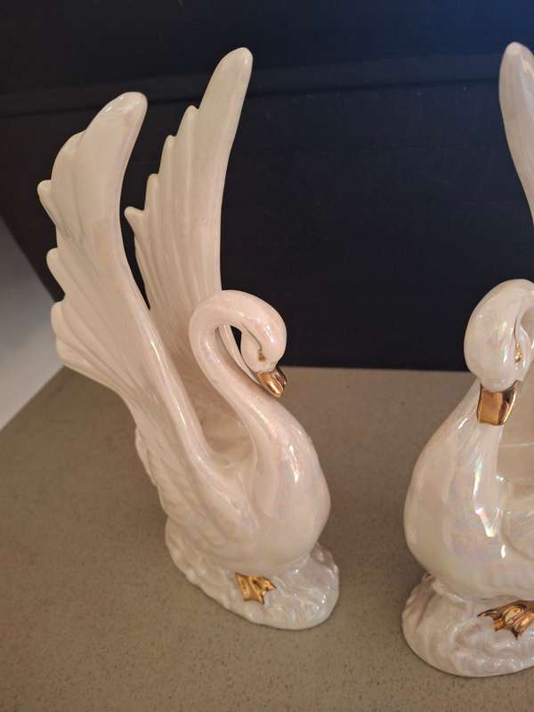 Pair of luster style procelain swans