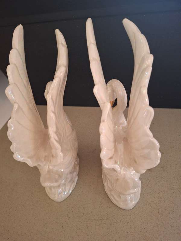 Pair of luster style procelain swans