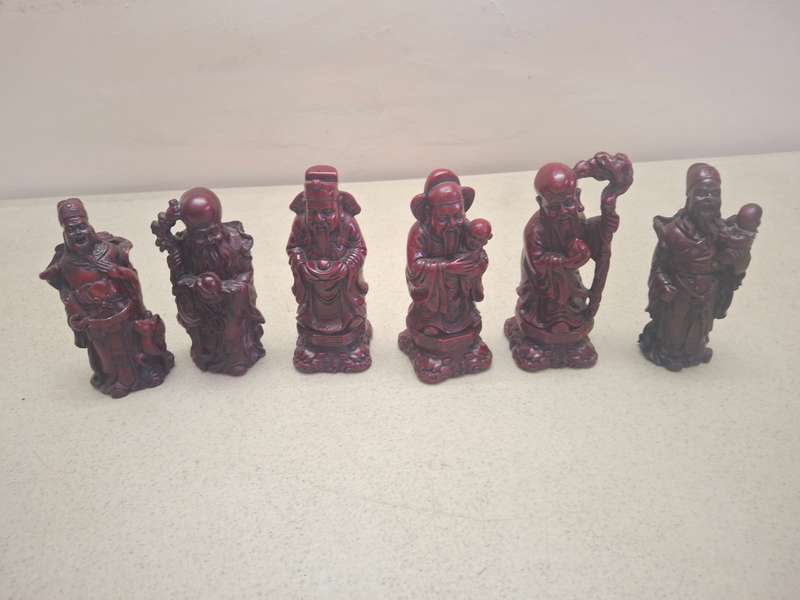 Six meduim sized oriental figurines