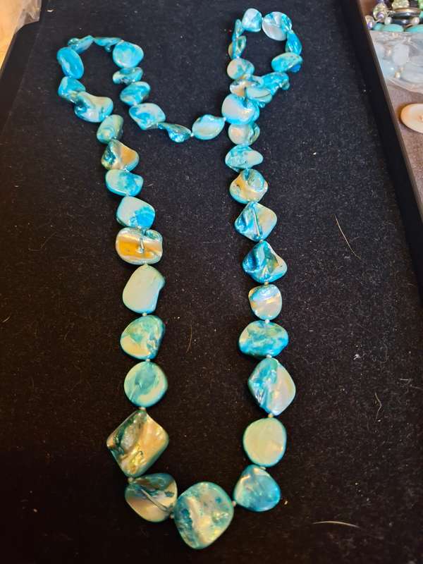 Long blue died shell necklace