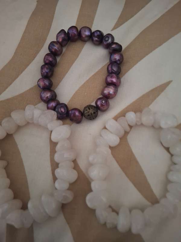 Three assorted ladies bangles two semi precious