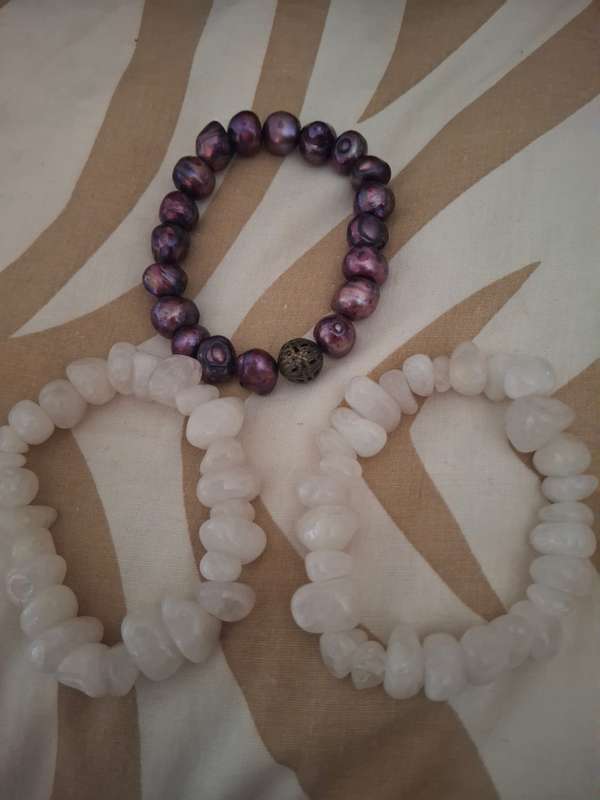 Three assorted ladies bangles two semi precious