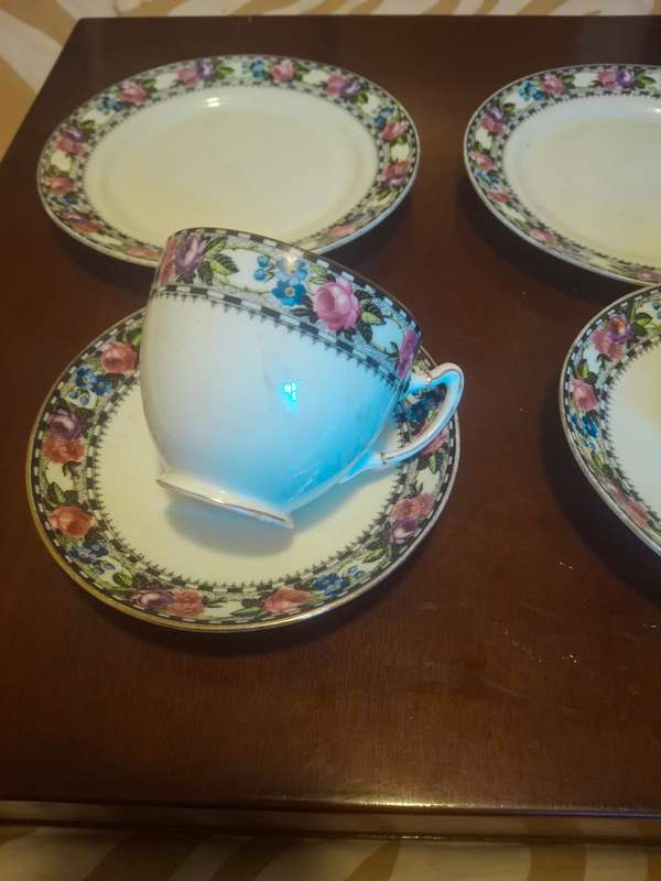 A pair of paragon tea cup trios