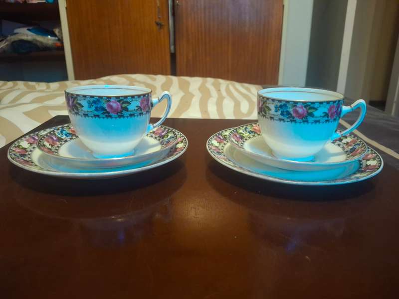 A pair of paragon tea cup trios