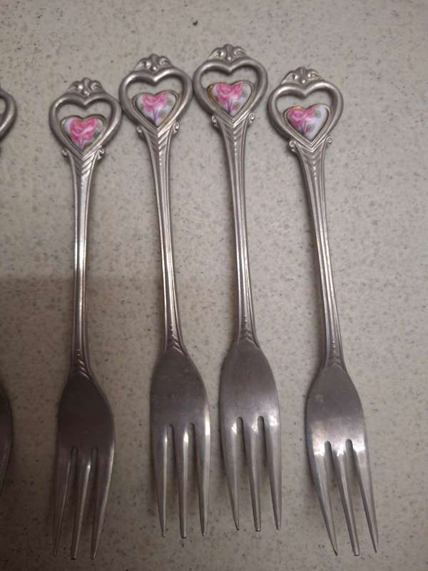 A set of pretty sliver plated cake forks