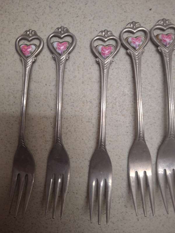 A set of pretty sliver plated cake forks