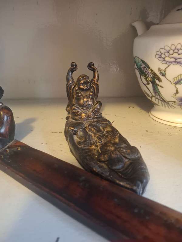 Two wooden inscene holders