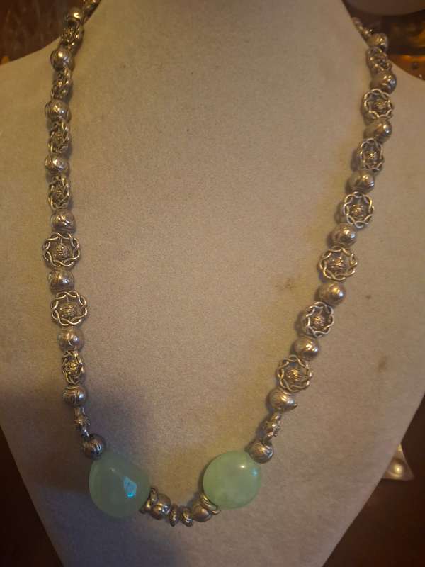 Long sliver tone costume necklace with semi precious stones