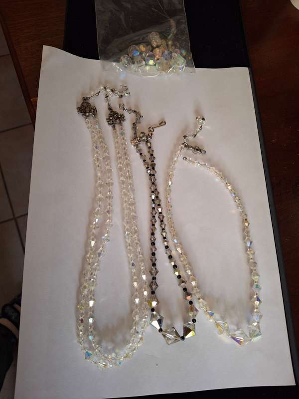 Assorted vintage crystal necklaces and beads