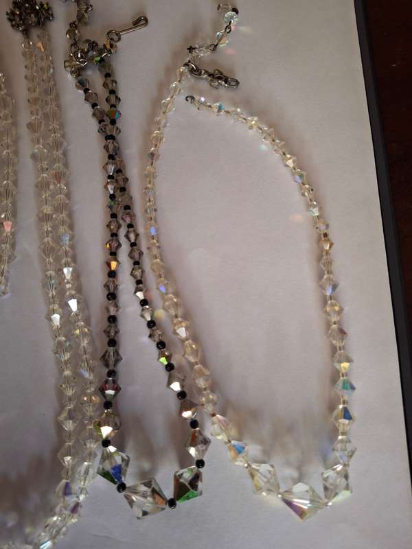 Assorted vintage crystal necklaces and beads