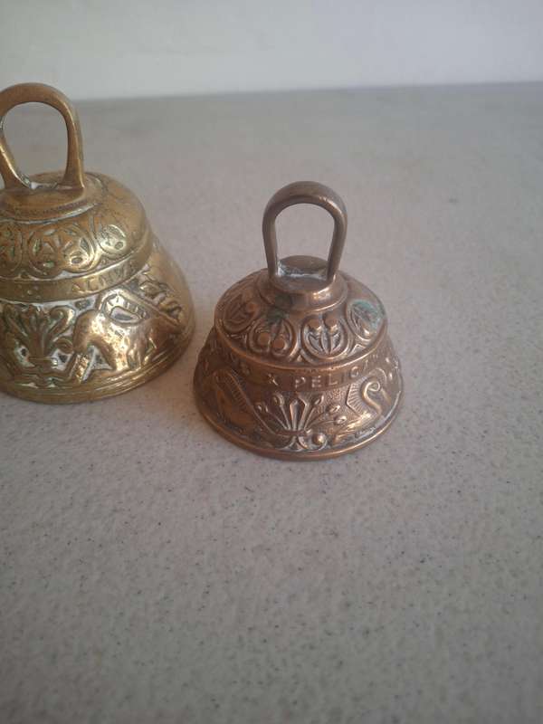 Two small brass bells