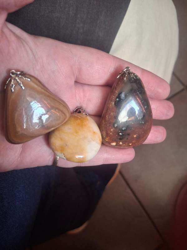 Three assorted semi preciuos stone pendants