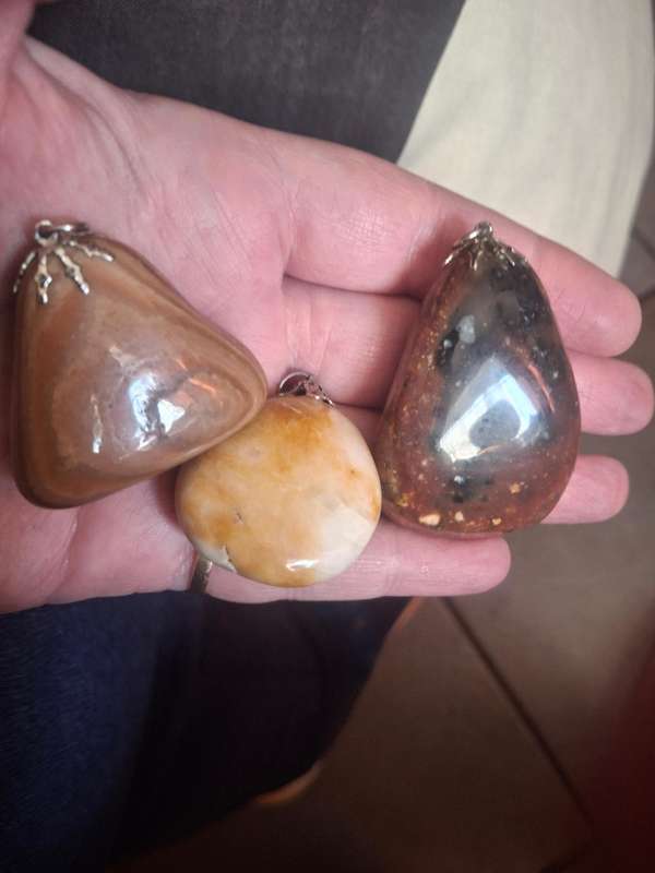 Three assorted semi preciuos stone pendants