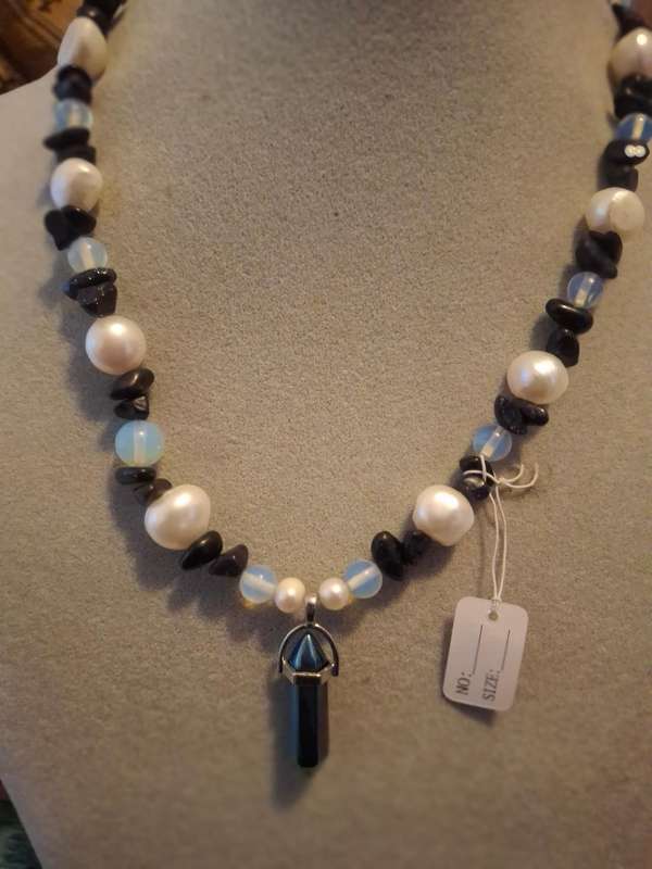 Well made beaded pearl.and stone necklace