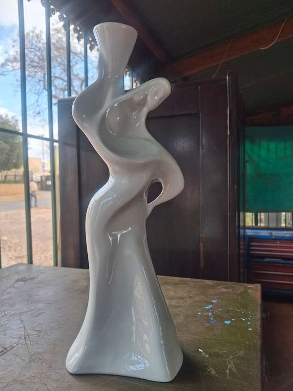 Nice more modern decorative. Cermaic candle holder