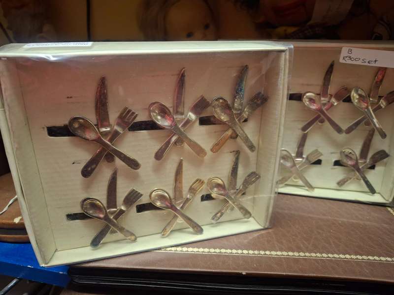 Two boxed sliver plated napkin rings