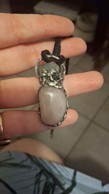 Well made metal rose courts and aquarmaine pendant