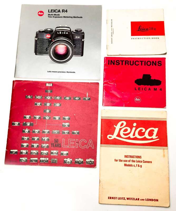 11x Camera Booklets and Manuals (Leica, Canon, Nikon)