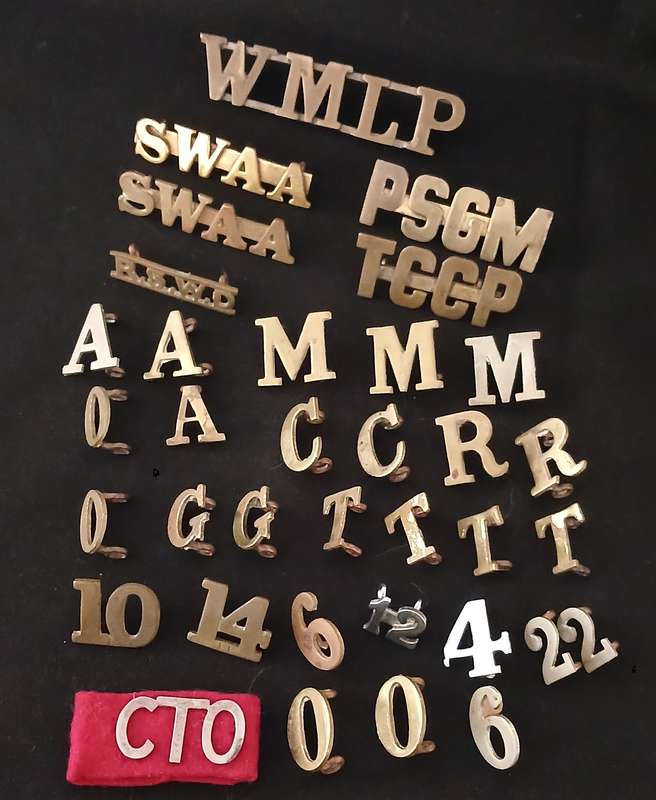 35 X SHOLDER TITLES AND NUMERALS        ( ONE BID FOR THE LOT )           L273