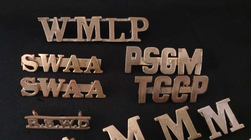 35 X SHOLDER TITLES AND NUMERALS        ( ONE BID FOR THE LOT )           L273