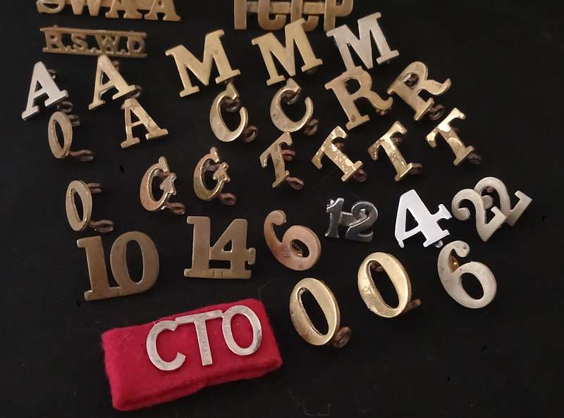 35 X SHOLDER TITLES AND NUMERALS        ( ONE BID FOR THE LOT )           L273