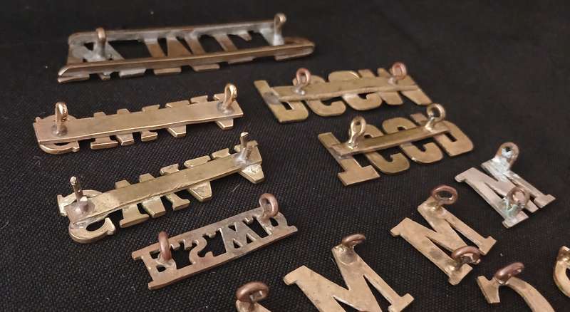 35 X SHOLDER TITLES AND NUMERALS        ( ONE BID FOR THE LOT )           L273