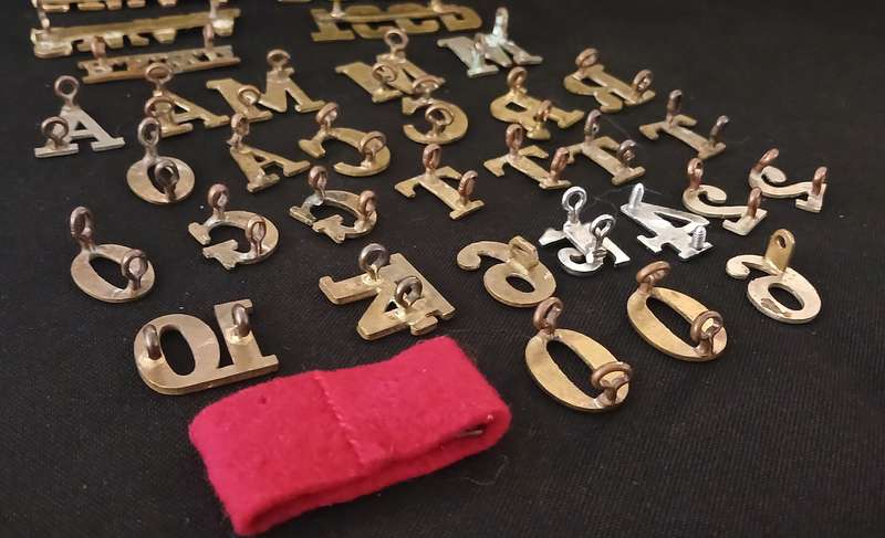 35 X SHOLDER TITLES AND NUMERALS        ( ONE BID FOR THE LOT )           L273