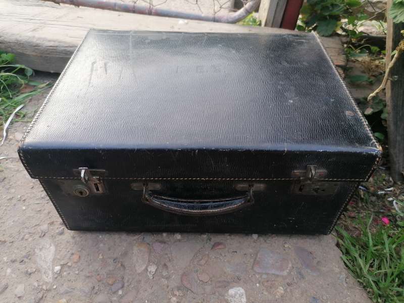 Vintage travel suitcase. Great character