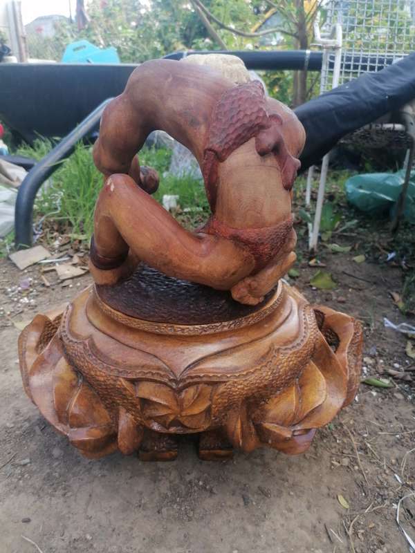 Stunning solid wood carved pot with figure