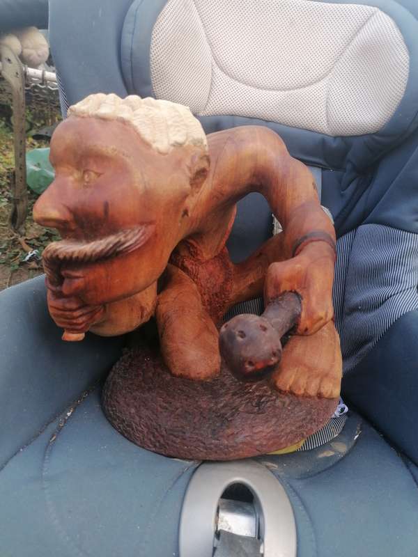 Stunning solid wood carved pot with figure