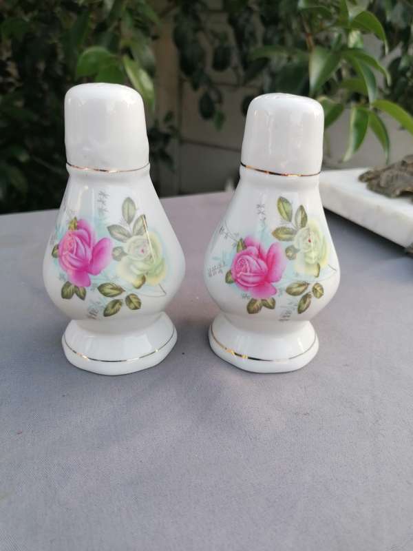 Vintage porcelain salt and pepper holder