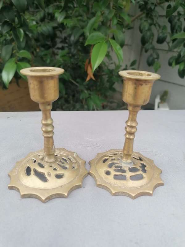 Pair of small antique brass candle holder
