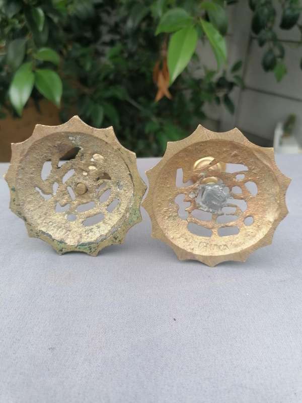 Pair of small antique brass candle holder