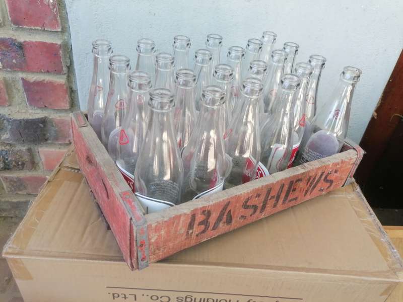 Vintage bottles with crate