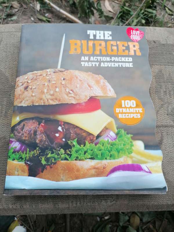 The burger an action packed tasty adventure 100 dynamite recipes