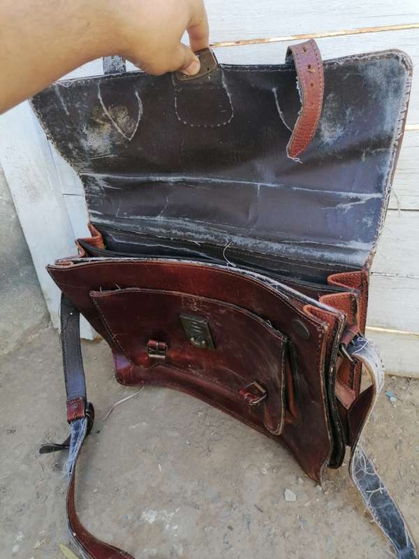 Handcrafted freestyle leather bag. Needs some tlc but usable