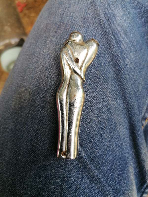 Vintage nude man and women kissing lighter