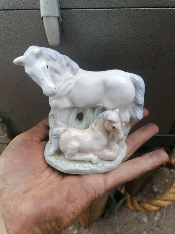 Heritage porcelain mother love. Chip to ear small crack on other