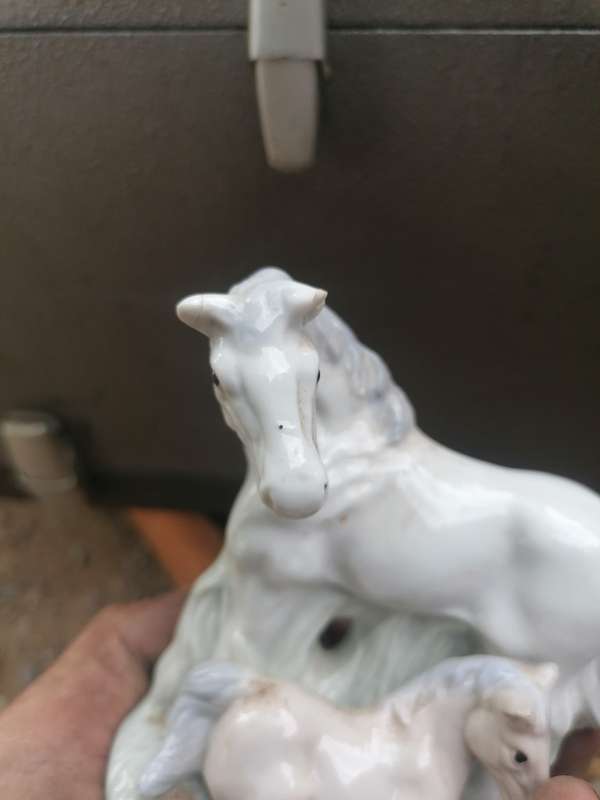 Heritage porcelain mother love. Chip to ear small crack on other