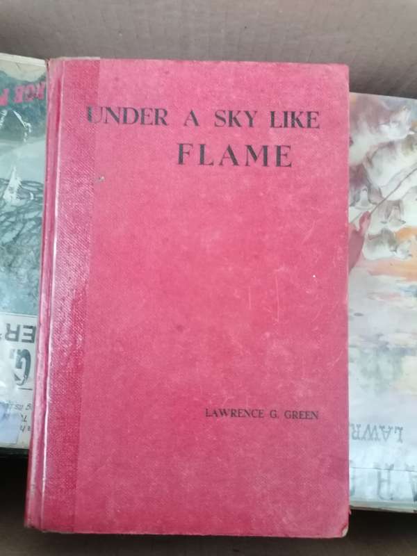 Under a sky like flame by Lawrence G. Green
