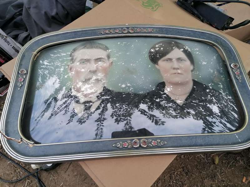 Antique framed photo with bubble glass
