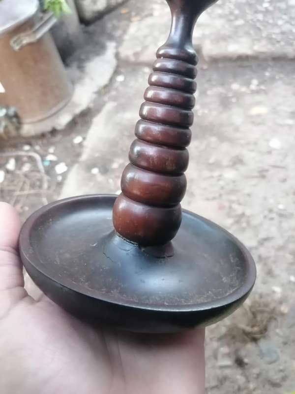 Antique wood candle holder