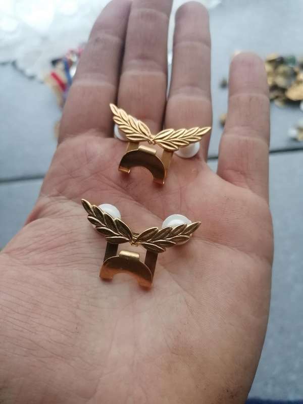 Hangers worn on SA Police tunics for recieving medals on parade. Bid per item