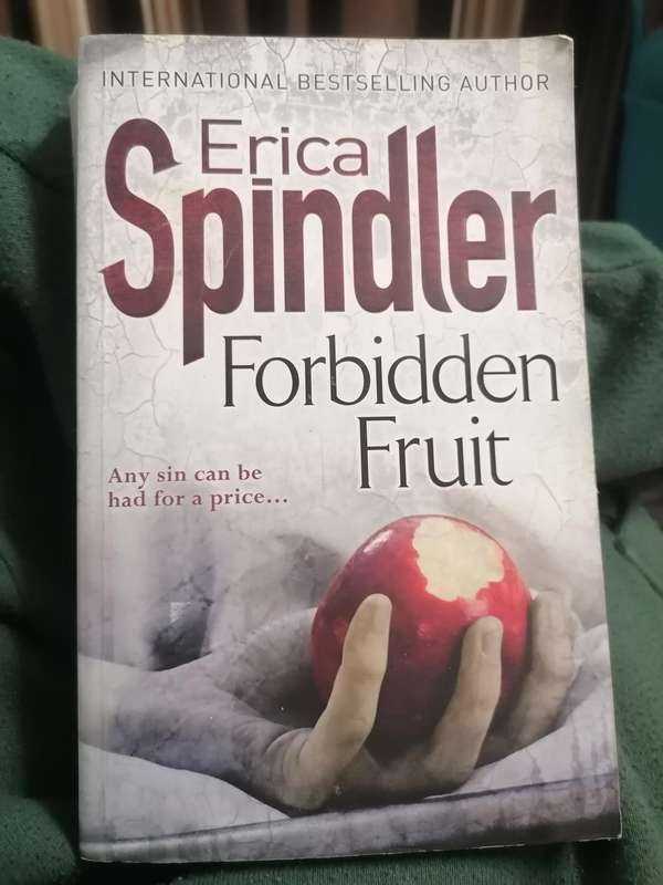 the book "Forbidden Fruit" by Erica Spindler.